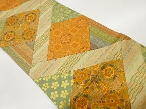 切り嵌め華紋に花唐草・縞模様織出し全通袋帯